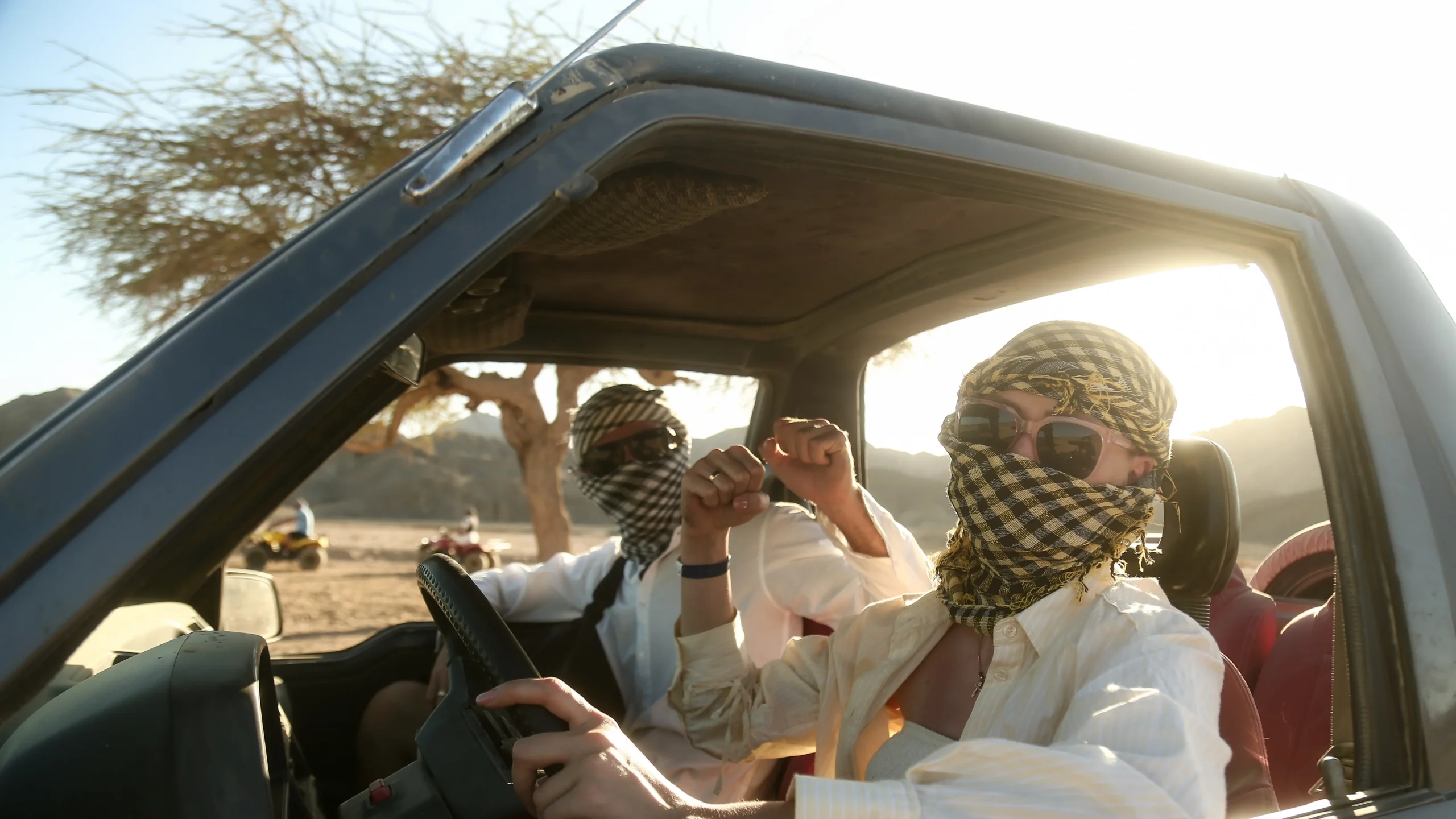 marsa alam star gazing adventure european couple posing in suziki vitara car