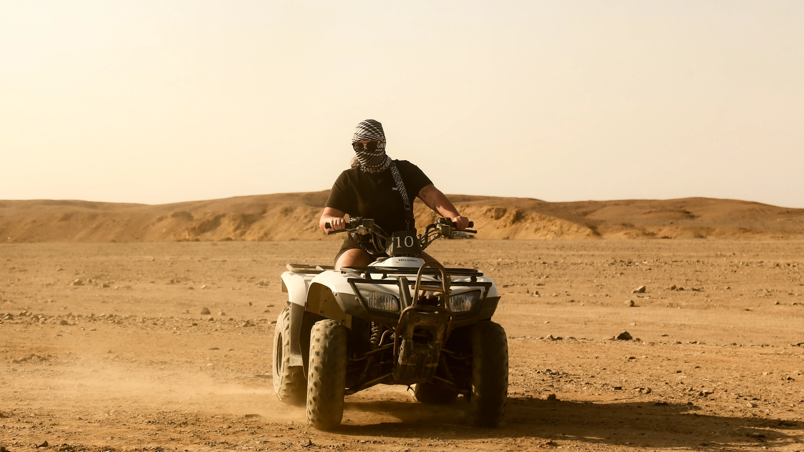 private quad tour italian girl drifting in marsa alam desert.webp